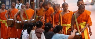 monks collecting alms at dawn