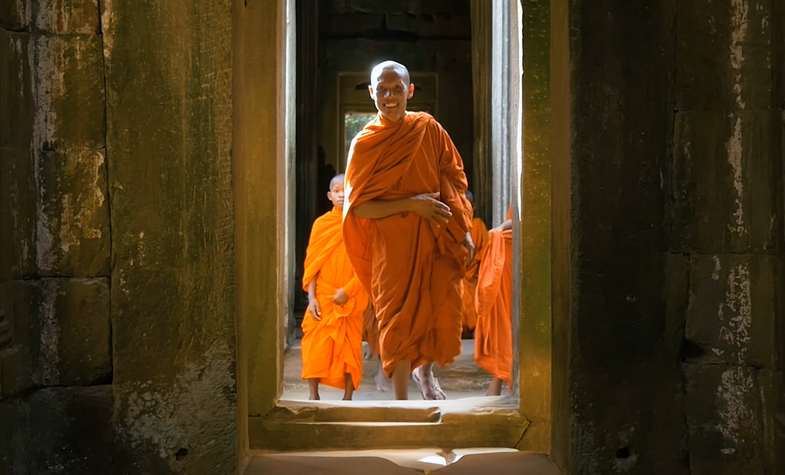 Pictures of the monks in Angkor Wat in the contrast