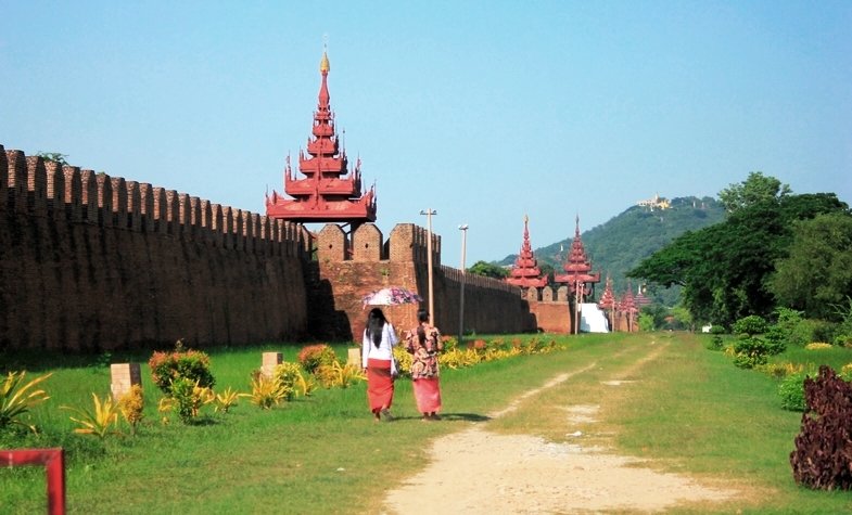 two girls walking along Mandalay Ancient Citadel 
