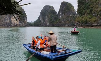 Boat rowing in Halong Bay
