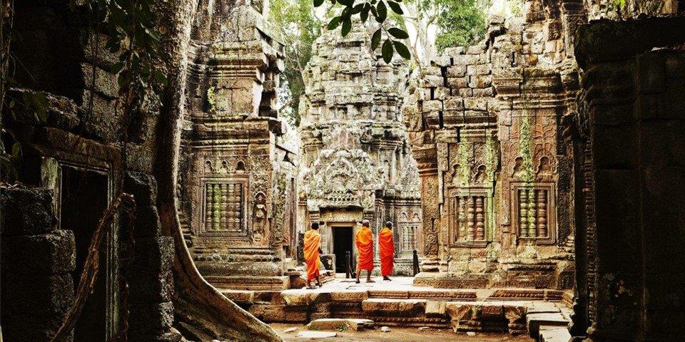 monks walking along Bantey Srei