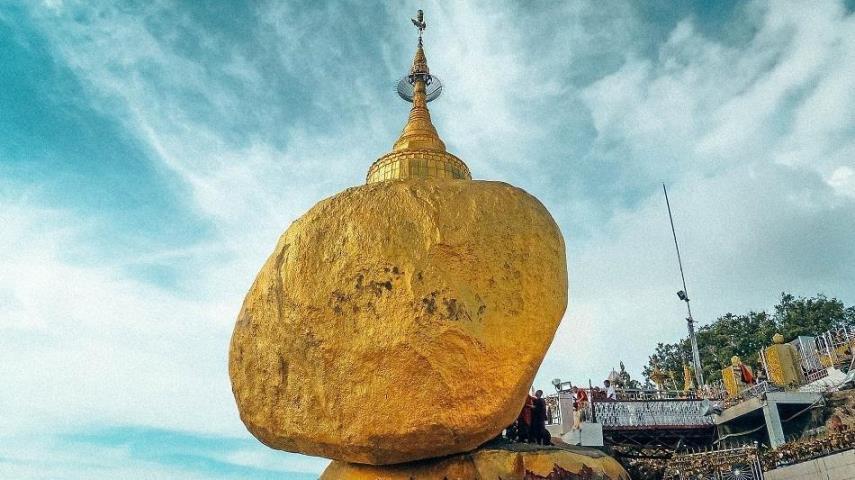 the Kyaiktiyo is built on a golden rock perching on top of a mountain