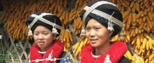 two Yao girls wearing silver jewels