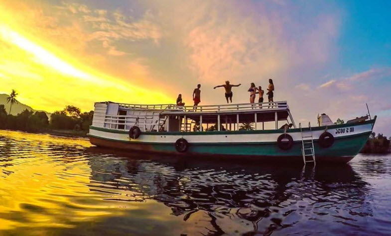 Take a sunset river cruise, exciting things to do in Kampot