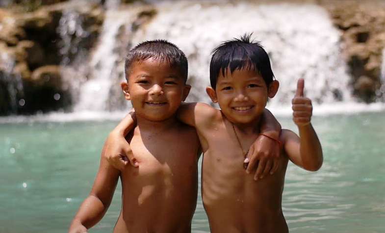 Children at Kuang Si Waterfalls