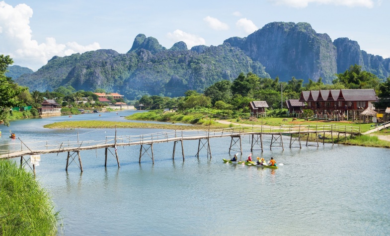 long wooden bridge across Nam Song river