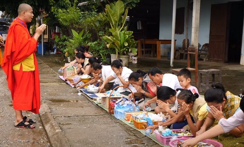 Monks in the alm giving day of Laos