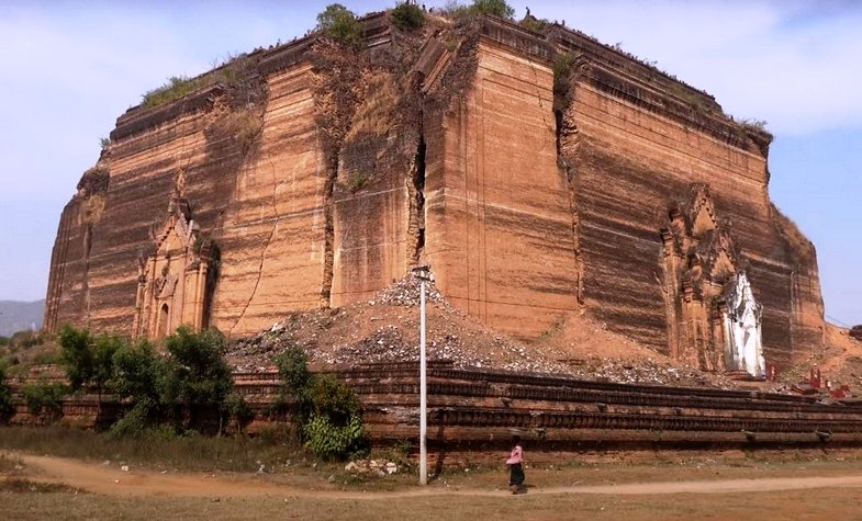 the enormous ruin of the ancient rock stupa Mingun Pahtodawgyi, the largest unfinished stupa in the world