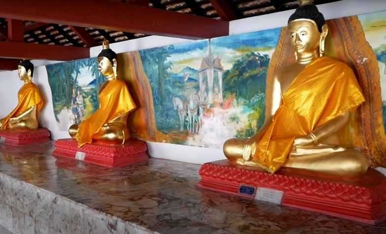 three golden Buddha statues