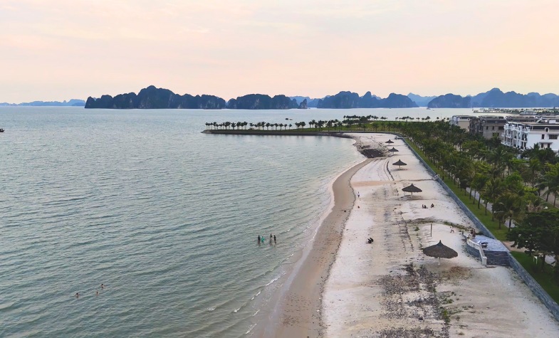 Tuan Chau Beach with white sand and calm sea