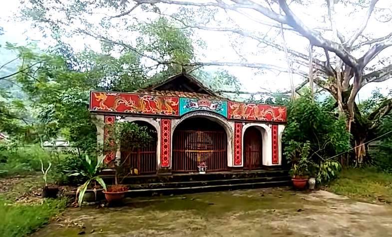 a small temple in Bac Son, Lang Son, painted in red and white